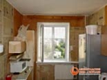 Фото установленного окна на кухне